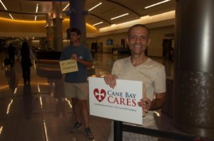 Cane Bay Partners employees volunteer to greet fellow employees and other evacuees from St. Croix to Altanta. 